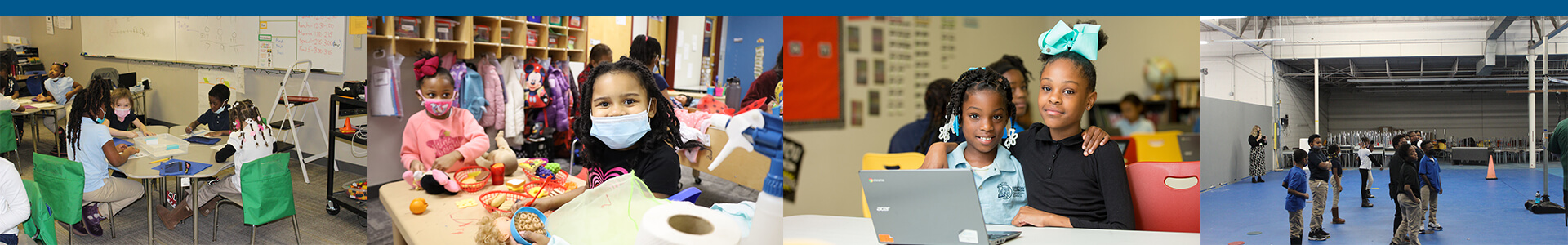 Four students standing together in the hallway - blue rectangle