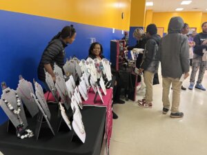 Benton Habror Charter School Academy students sell locally made products at the Black Excellence Expo at the school